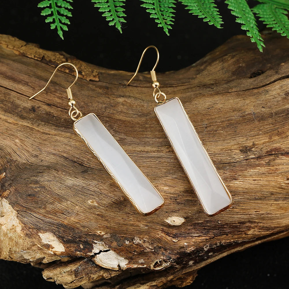 Moonstone Dangle Earrings in a tree nature setting
