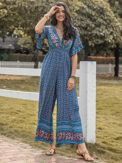 Floral Surplice Flutter Sleeve Jumpsuit - Eclectage