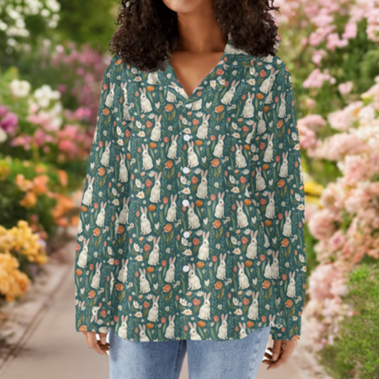 Model wearing rabbit button down shirt standing in colorful garden