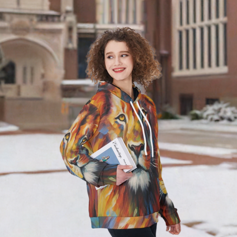 Model wearing lion hoodie and carrying a book, shown in front of a building on a snowy college campus